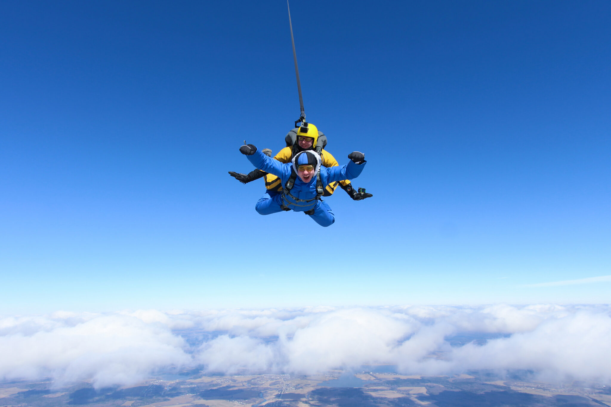 Tandem,Skydiving.,Above,The,Earth.